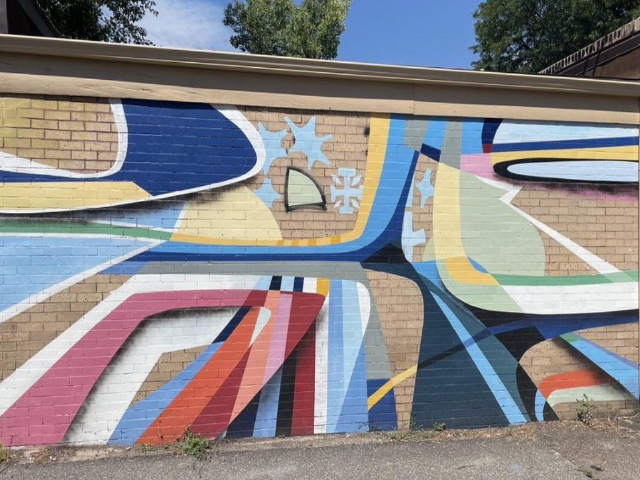 North Park Hill Garage mural in ally Belair
